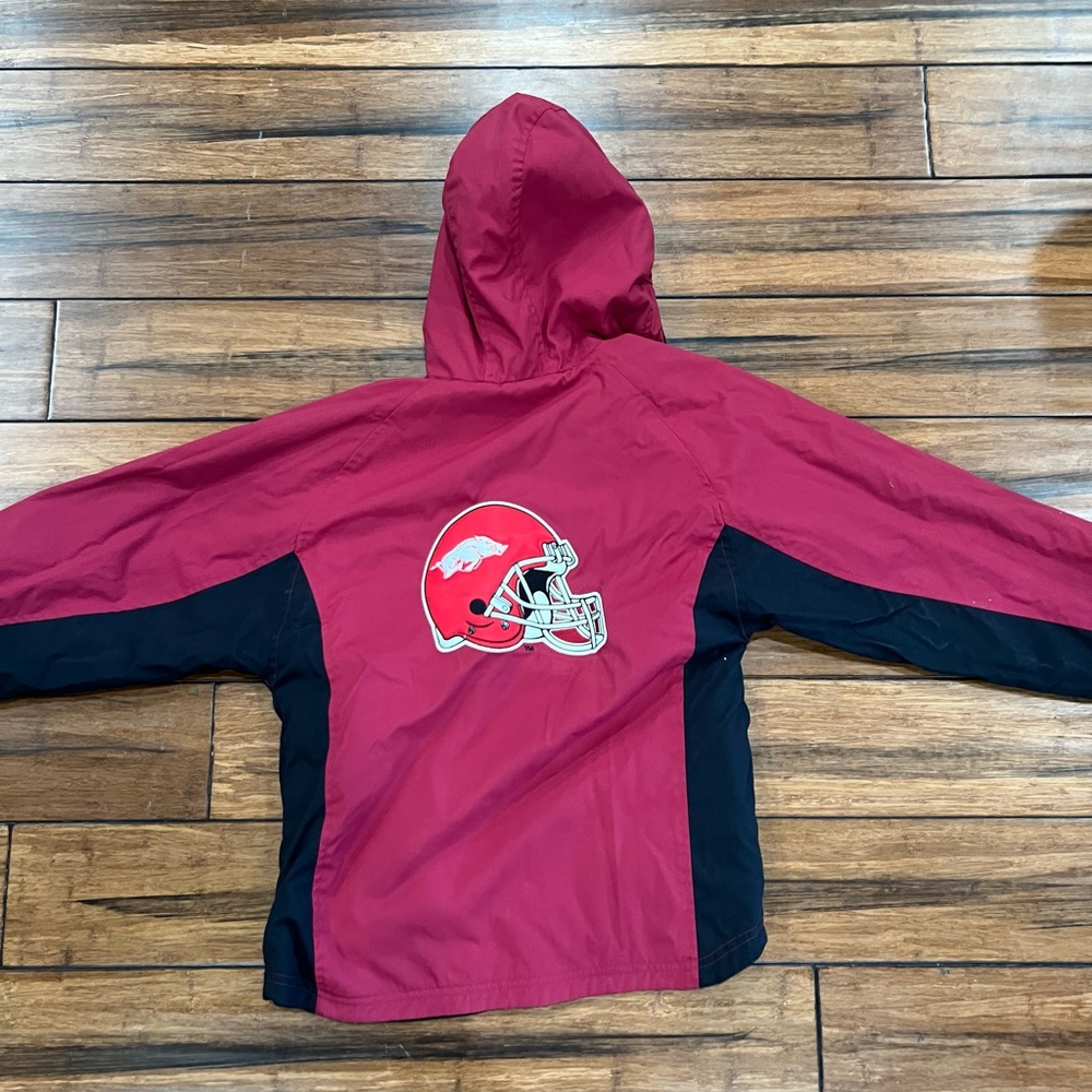 Boys Med 10/12 Revers-able Arkansas Razorback coat. One side is fleece.